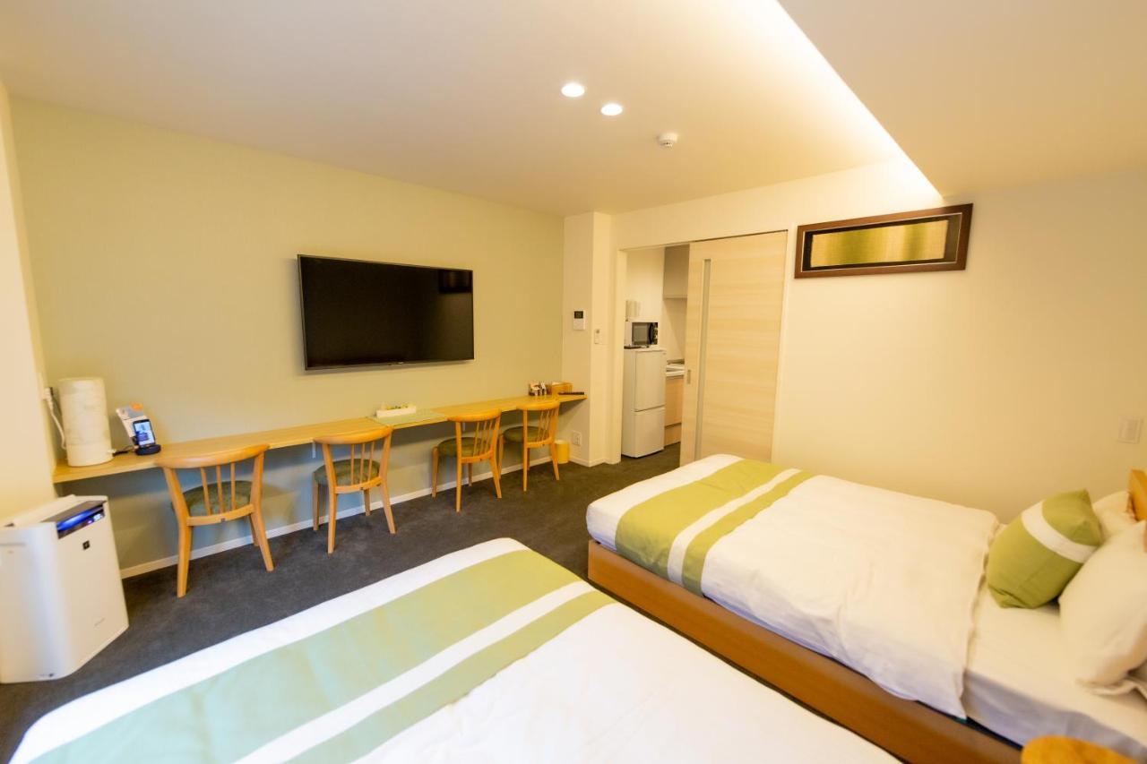 Aparthotel Grand Base Hiroshima Ekimae Exterior foto